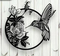 Hummingbird in Circle drinking from Flower