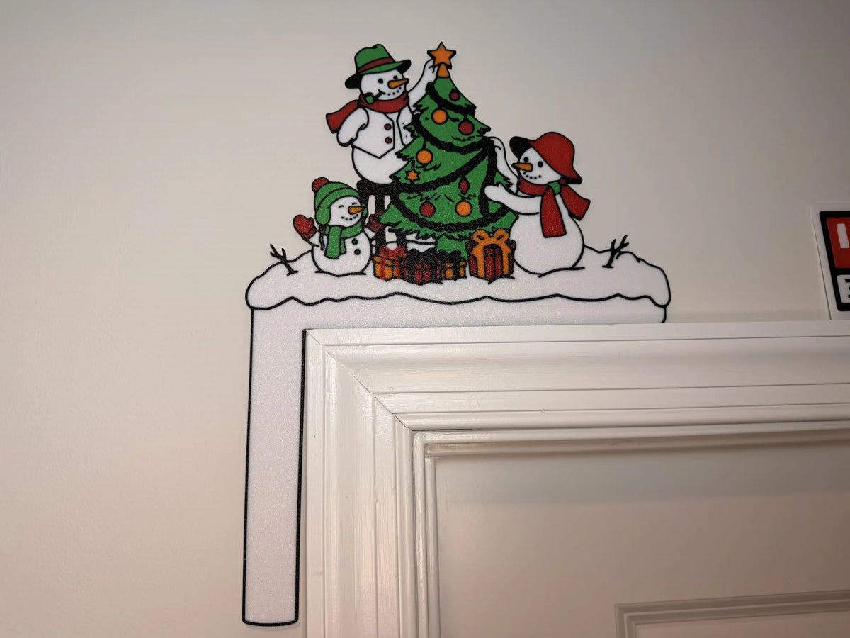 Door Frame Corner - Snowman decorating a tree with presents w/ RED Garland - 9 1/2 inches